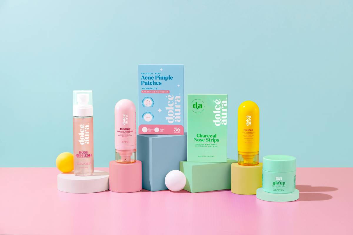 clean beauty women all natural skin woman applying aloe-vera-based serum to cheekbone with clean hands in natural light